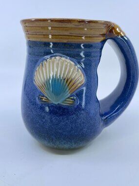 vintage handcrafted cape shore hand warmer ceramic mug with embossed shell desig